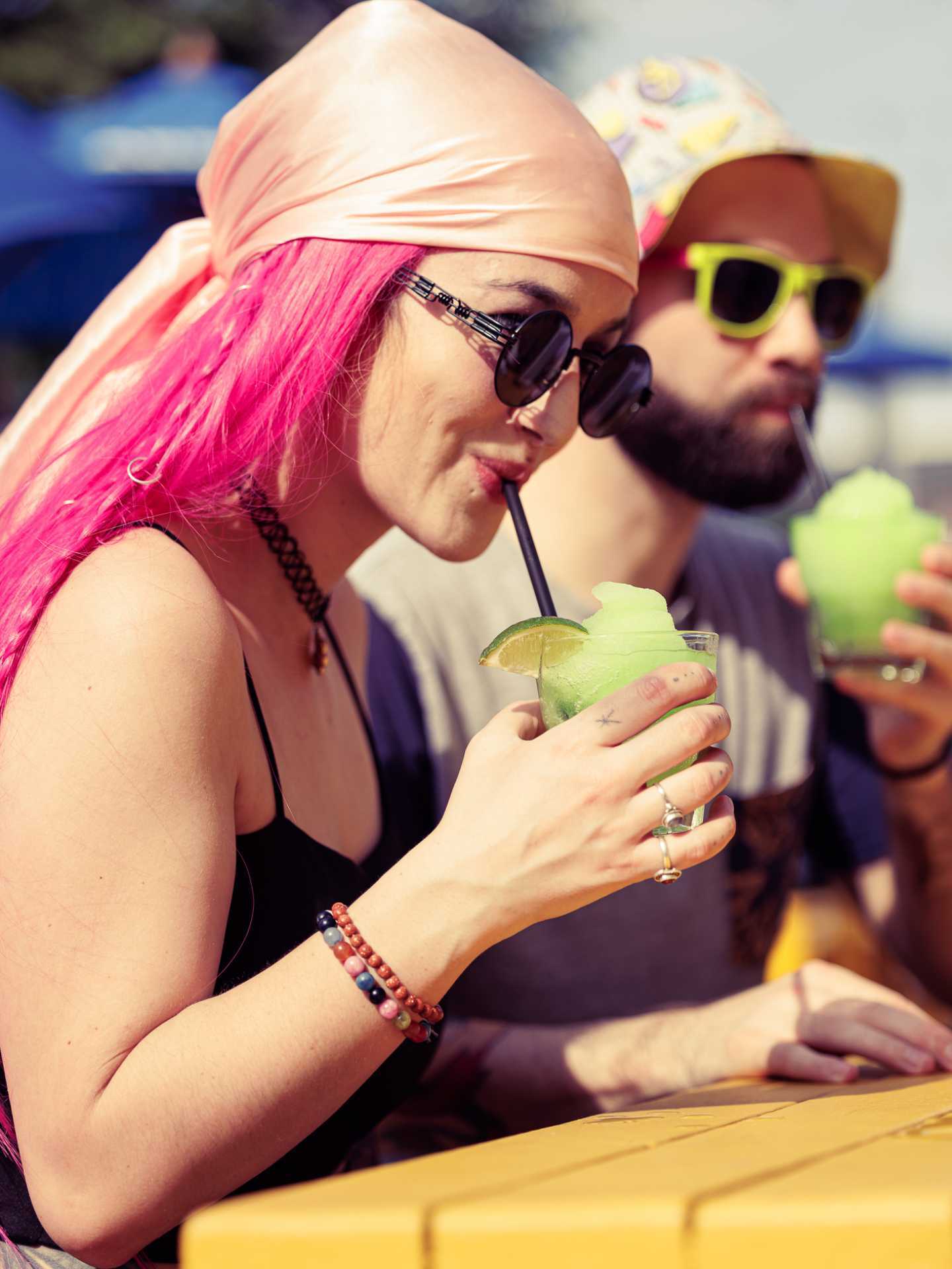 The best bars in Toronto | A guest enjoying a drink on the Pennies patio