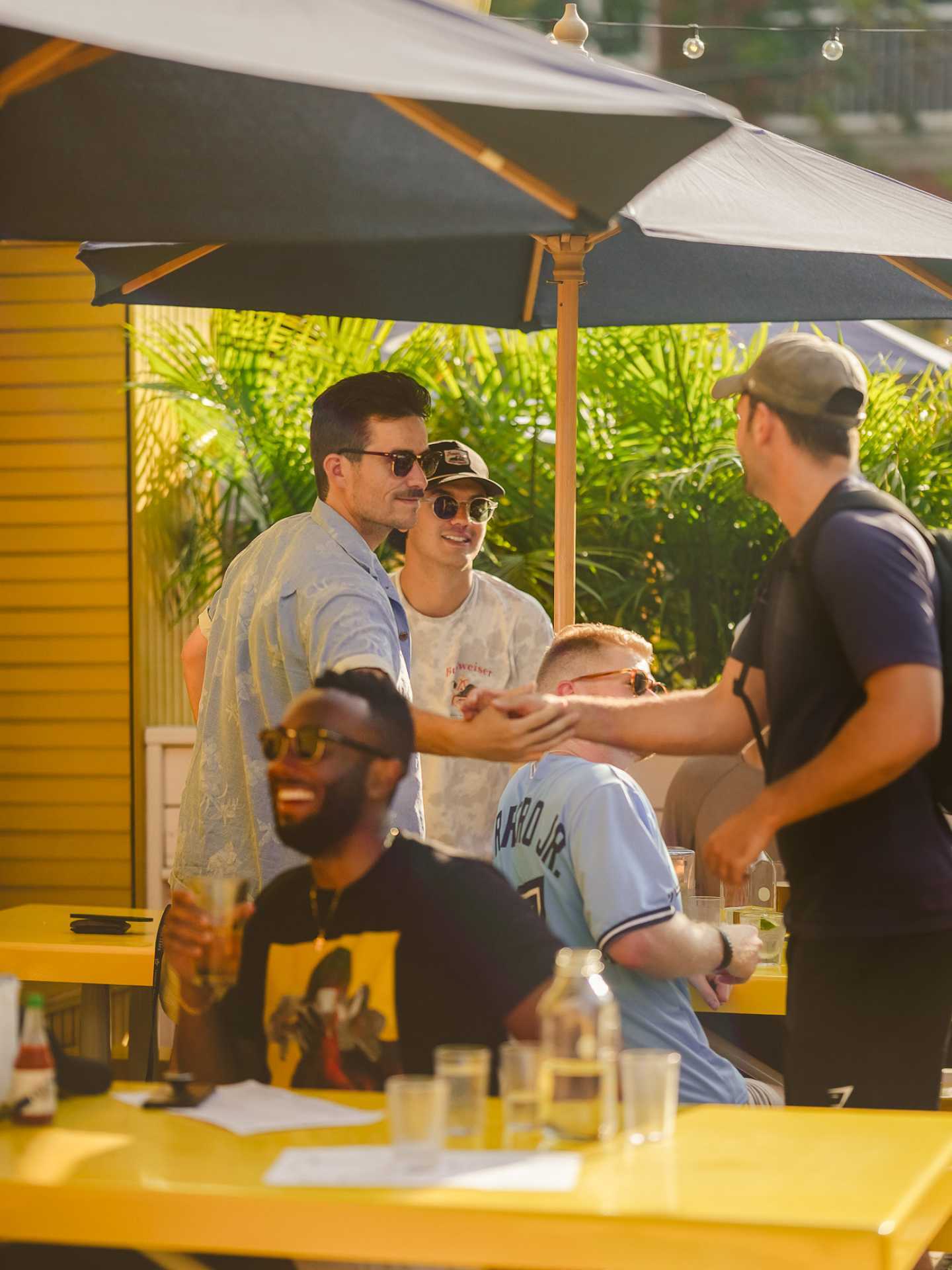 The best bars in Toronto | Guests enjoying the patio at Pennies