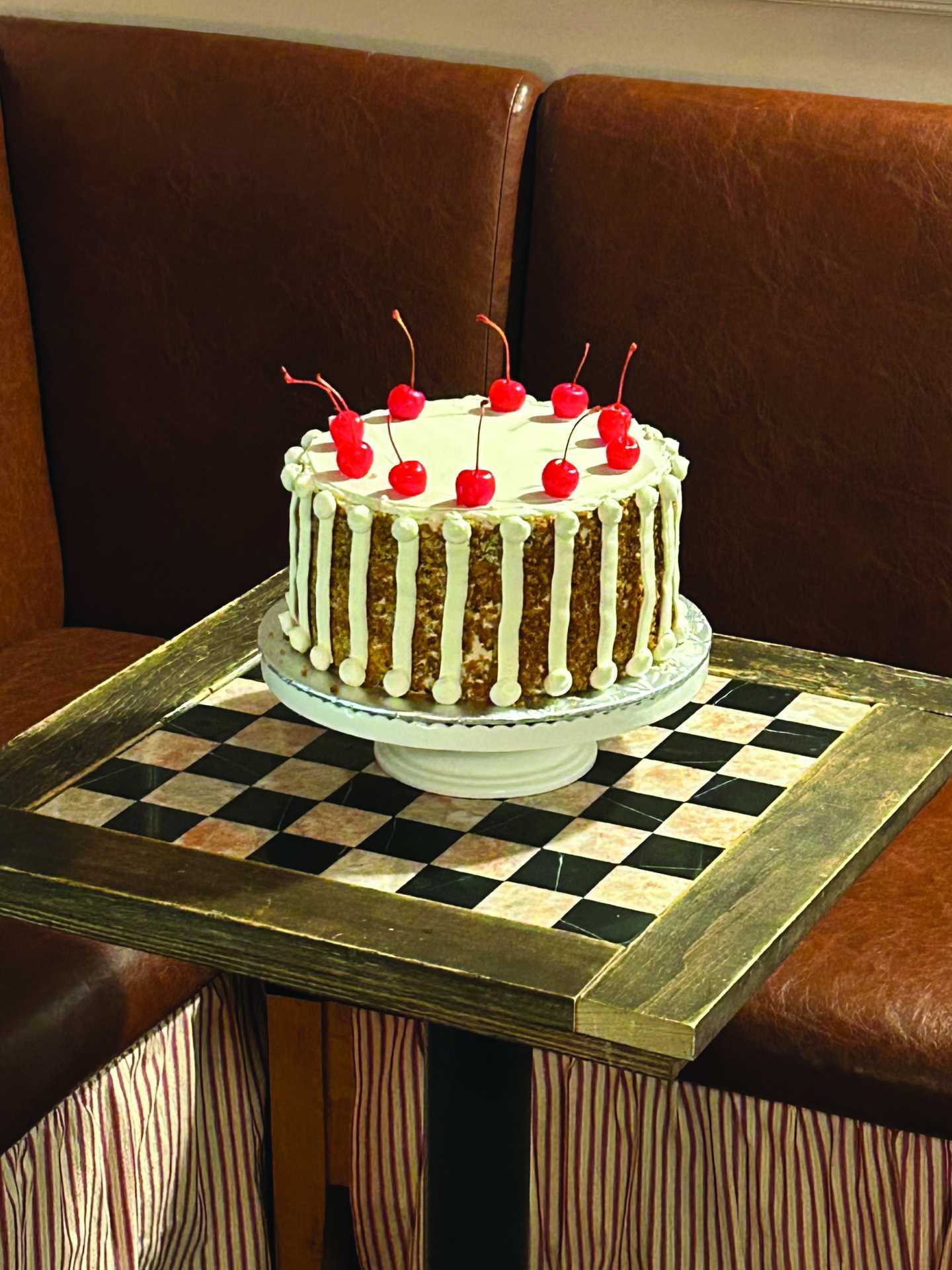 The best cafes in Toronto | A decorated cake at Coco's neighbourhood coffee shop
