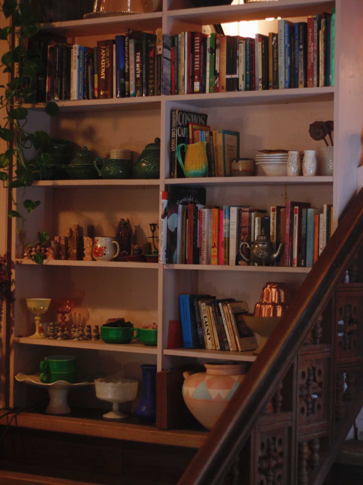 The best cafes in Toronto | A bookshelf at Coco's neighbourhood coffee shop