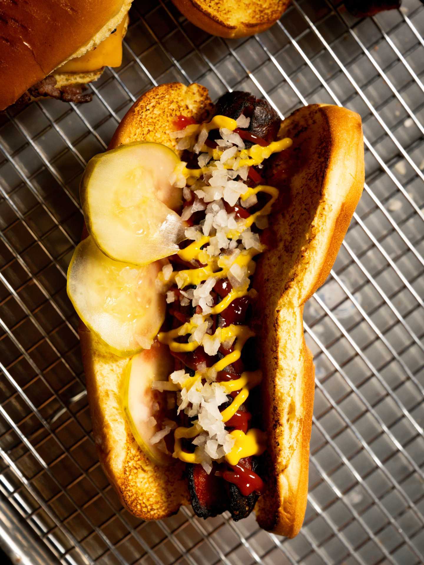 New restaurants Toronto | The charred hot dog from Elijah's Automatic Flame Broiled