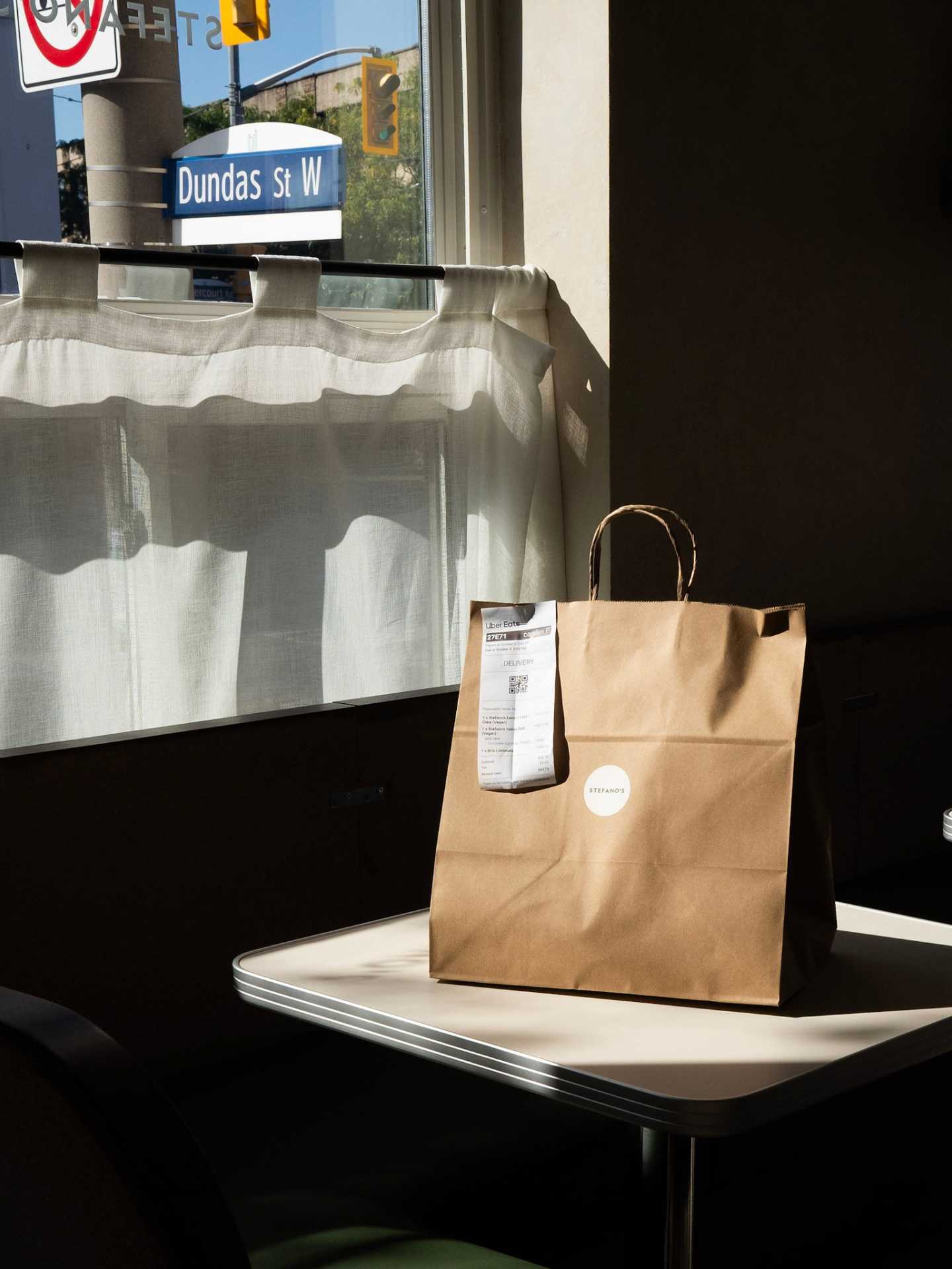 Best new restaurants Toronto | A takeout bag at Stefano's Diner in Toronto
