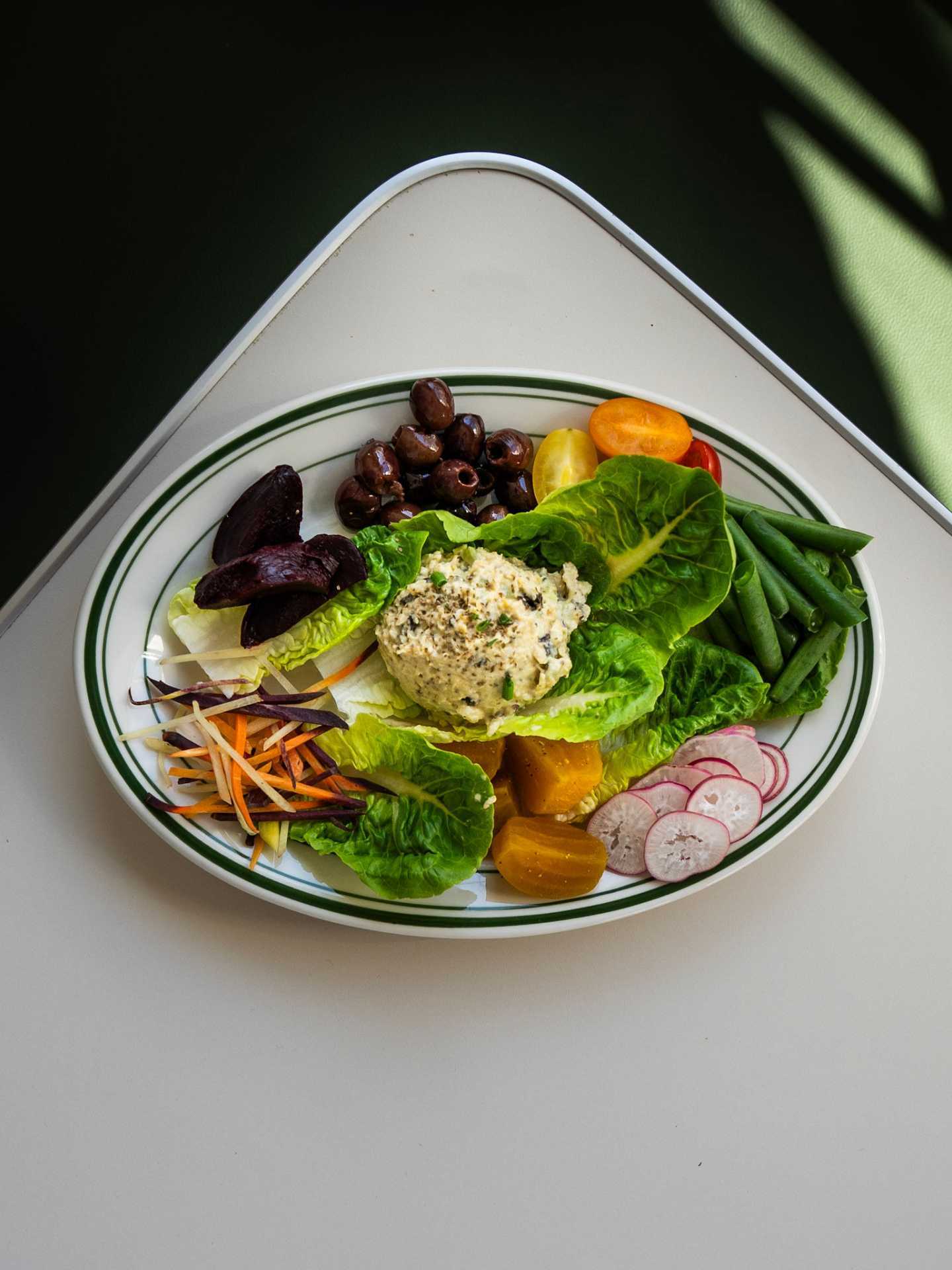 Best new restaurants Toronto | Insalata Nizzarda with plant-based chickpea and hearts of palm “tuna” at Stefano's Diner in Toronto