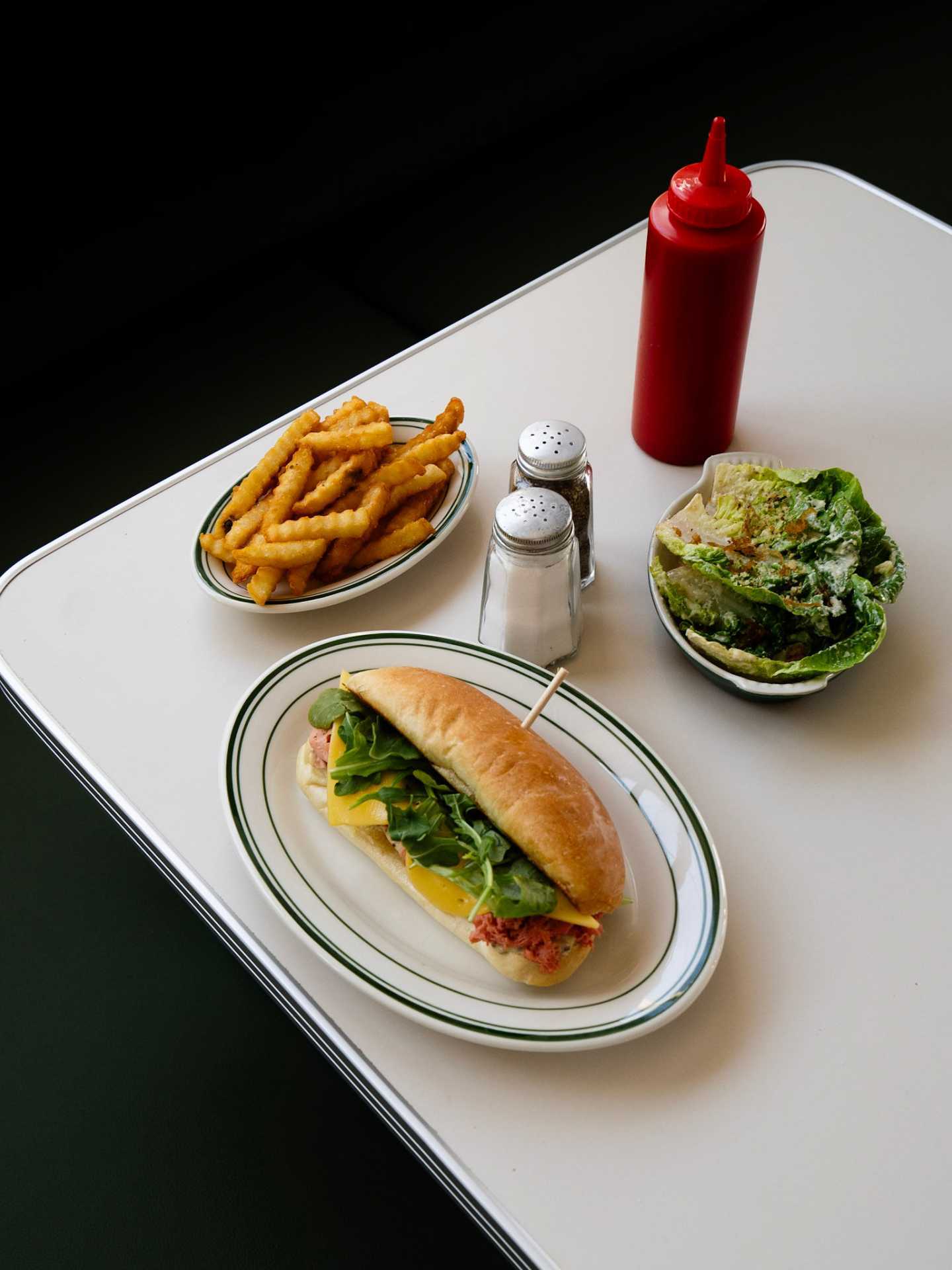 Best new restaurants Toronto | A sandwich, salad and fries at Stefano's Diner in Toronto