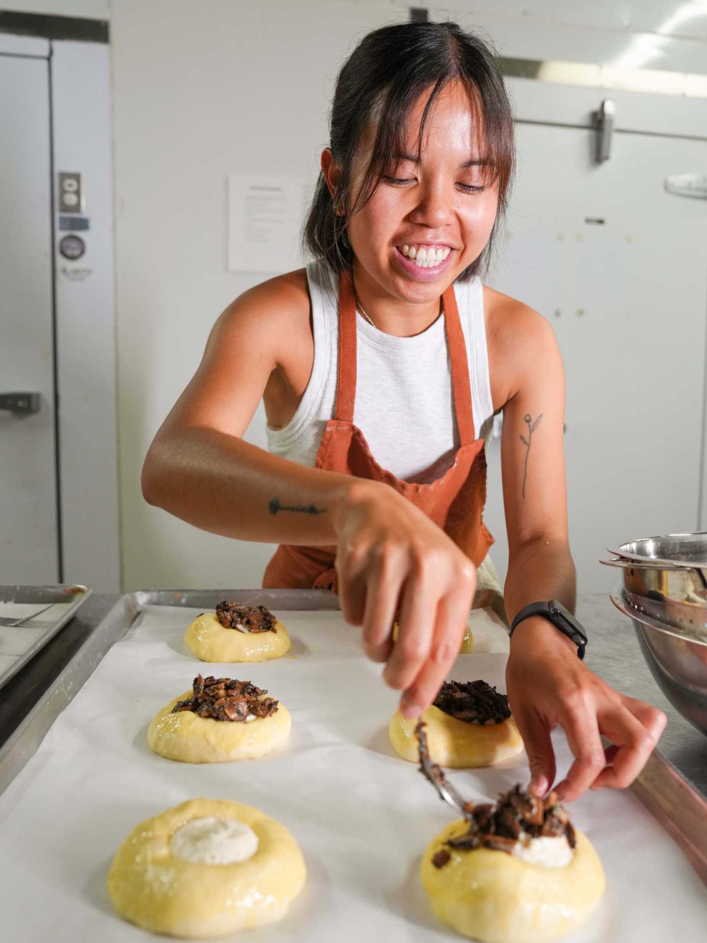 Rhea Abayan preparing pastries for Bakerrae Rhea Abayan preparing pastries for Bakerrae
