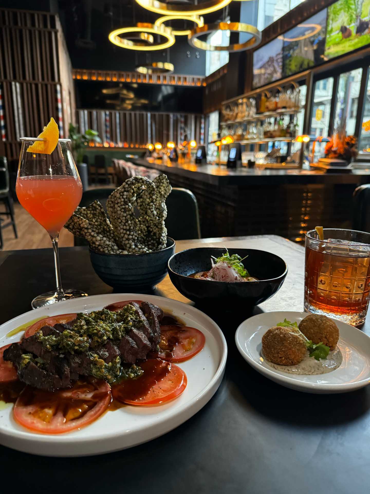 Flat iron steak and other dishes at Runway06