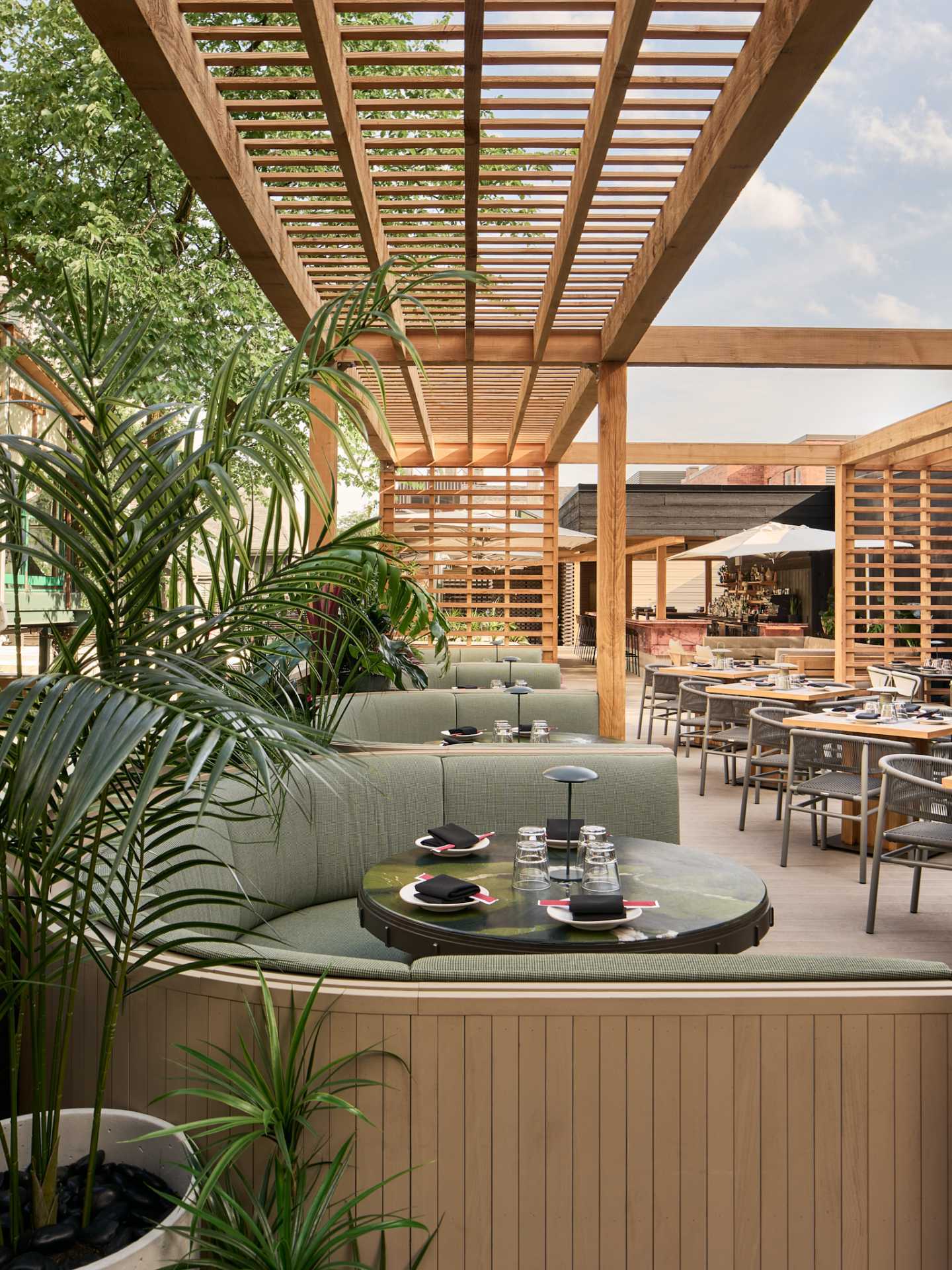 Best patios in Toronto | Booth seating on the patio at Kasa Moto