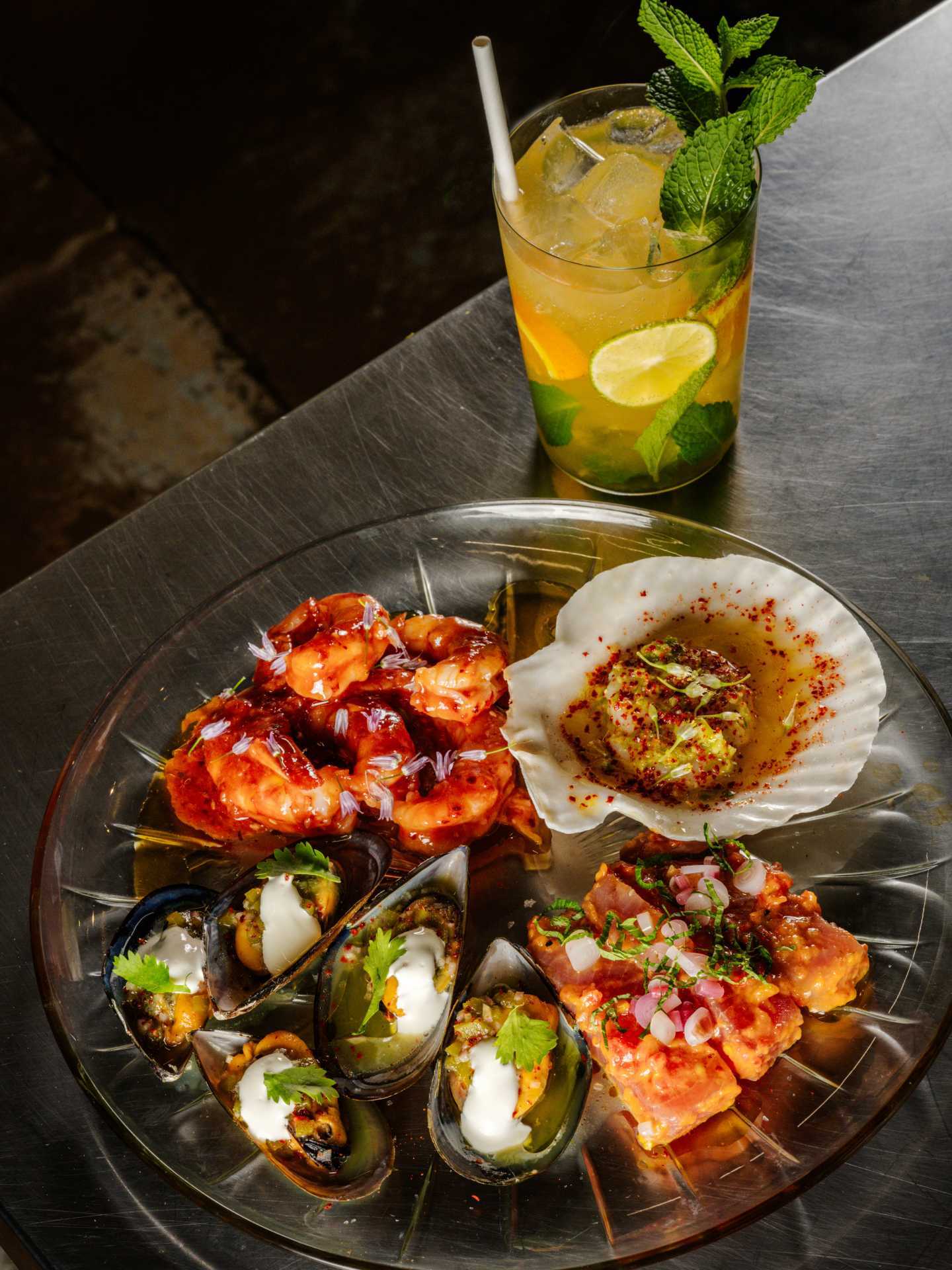 A seafood dish and a cocktail at Fat Rabbit in St. Catharines, Ontario