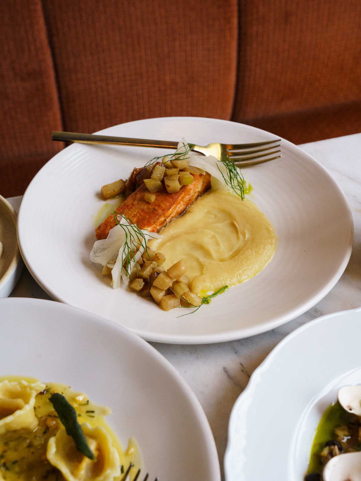 Queer-owned restaurants Toronto | New/School Foods plant-based salmon at Gia Restaurant