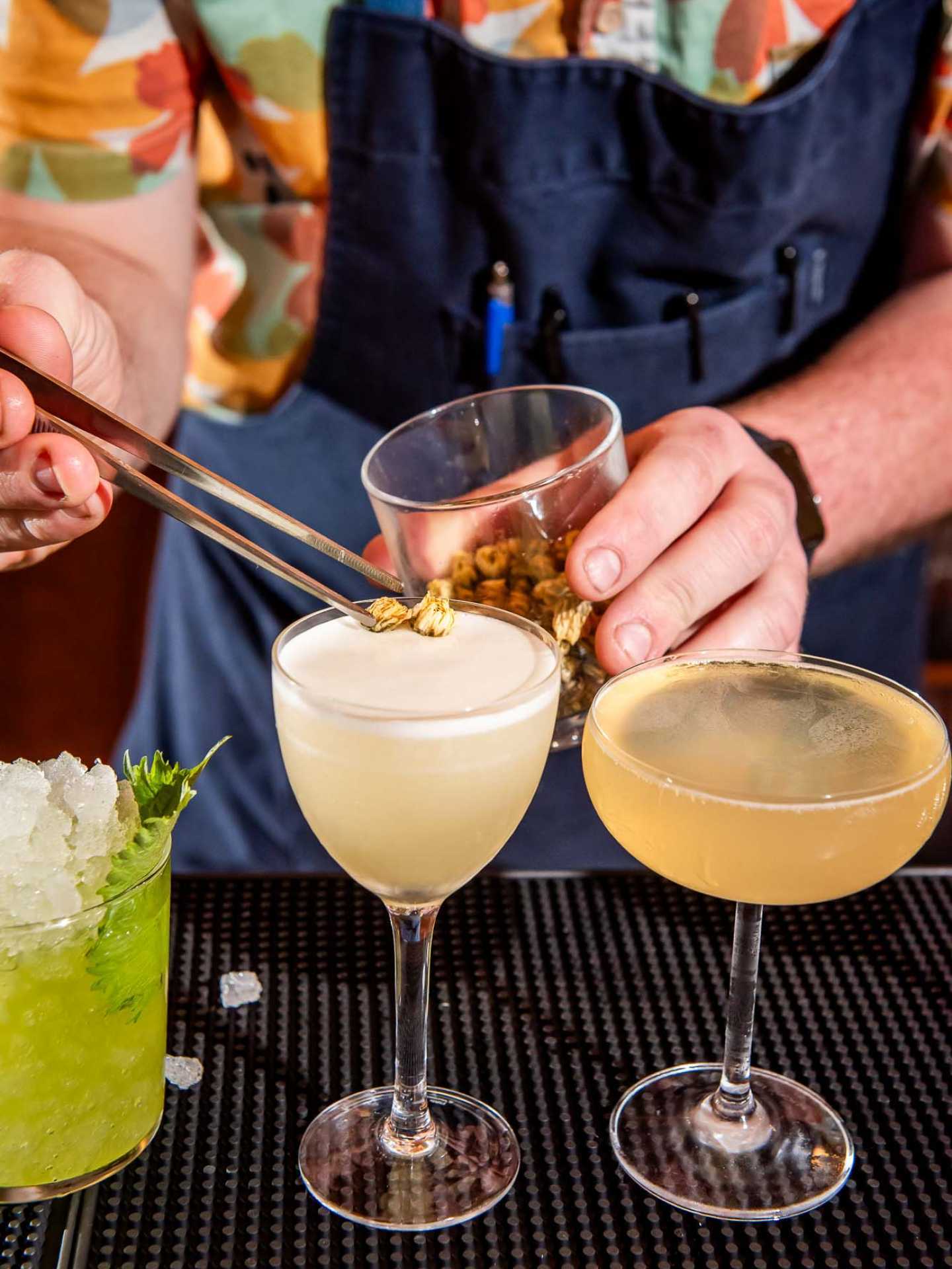 Toronto Summerlicious restaurants | Garnishing a cocktail at Lulu Bar