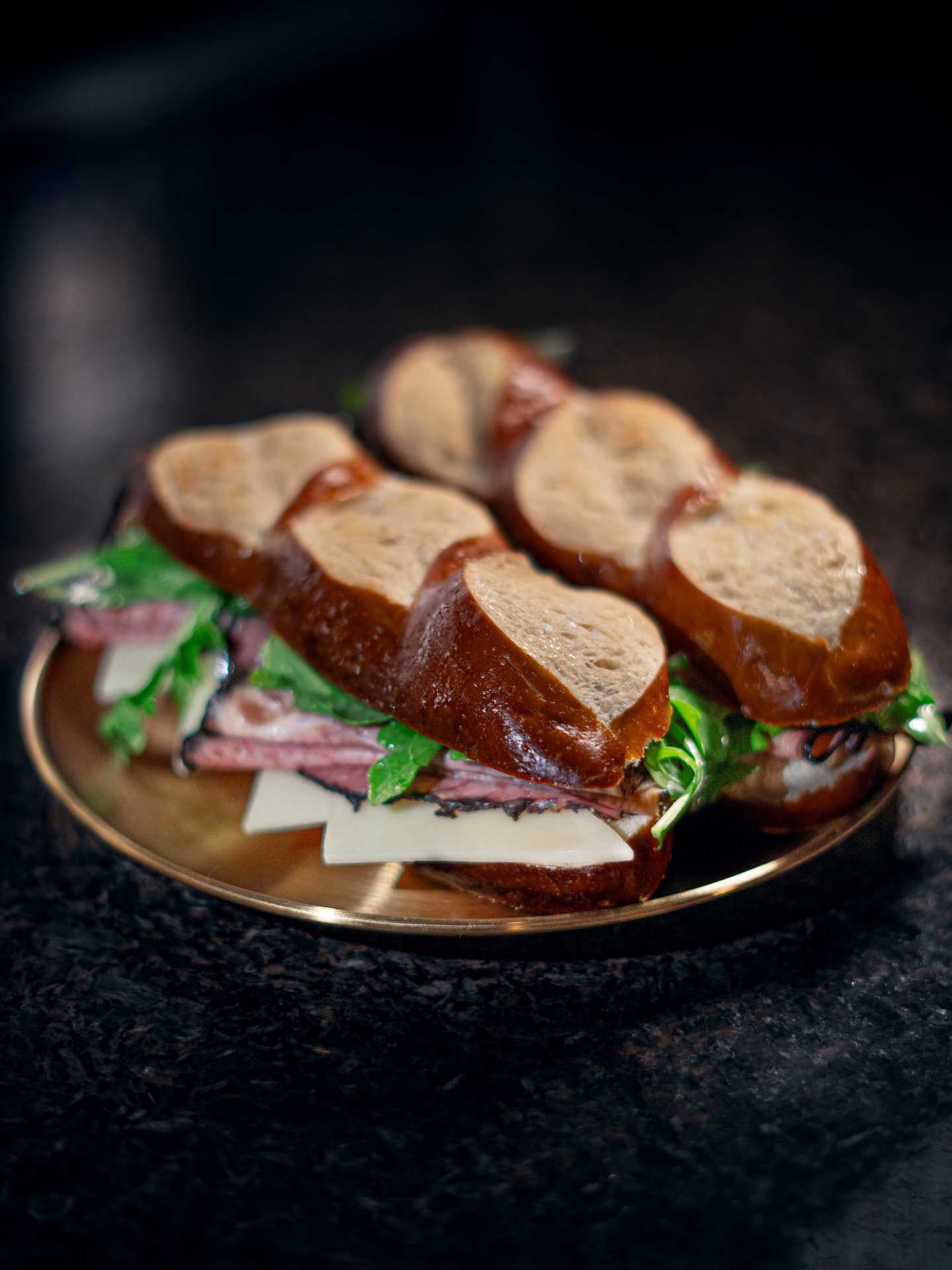 Roast beef pretzel sandwiches at Bitters and Bloom