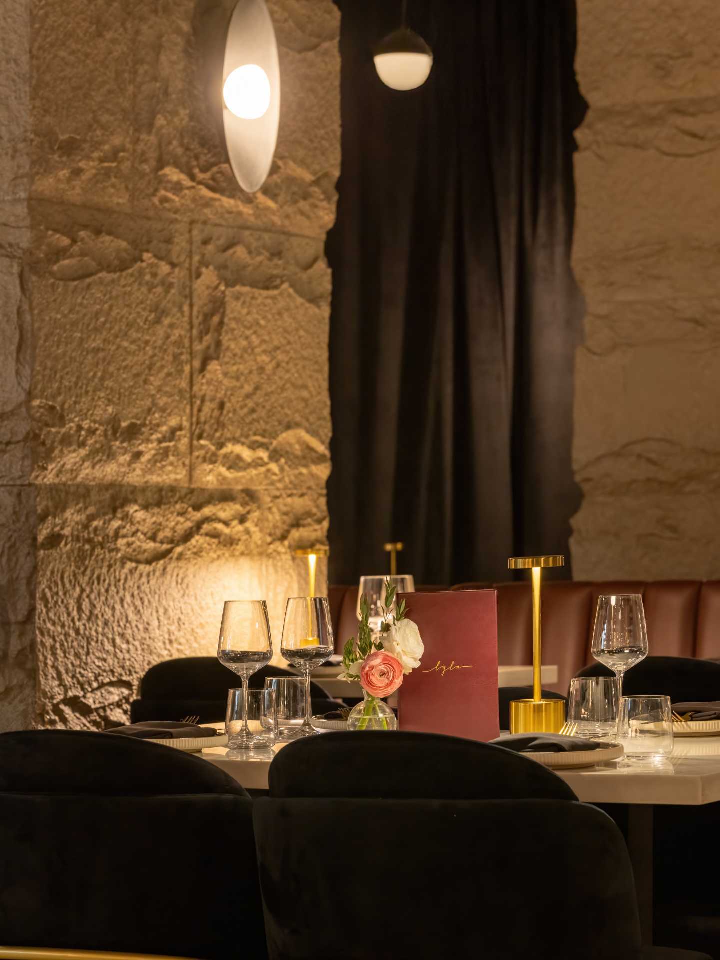 A set table inside Lyla Toronto