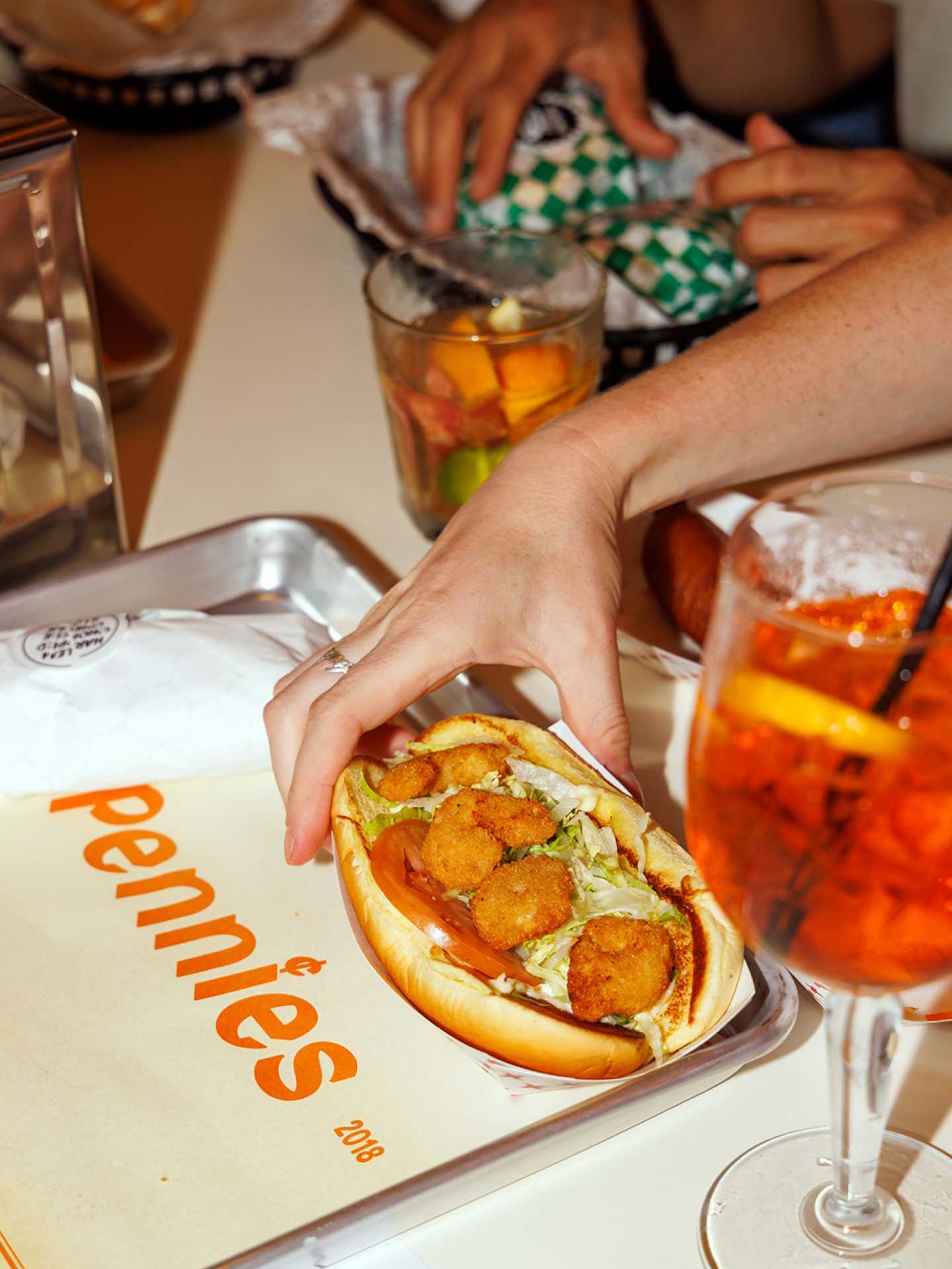 The best bars in Toronto | A seafood hot dog at Pennies on College