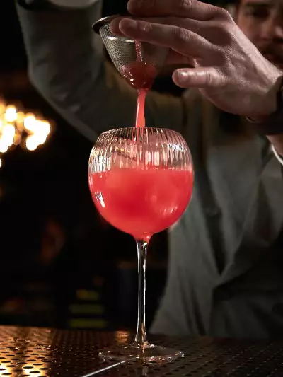 Best happy hours in Toronto | A red cocktail at Chotto Matte