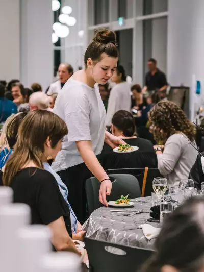 Indigenous food experiences in Canada | Serving a table at A Taste of the Atlantic