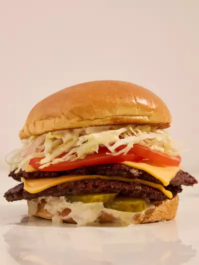 Best new Toronto restaurants | A stacked burger from Harry's Charbroiled in Waterworks Food Hall