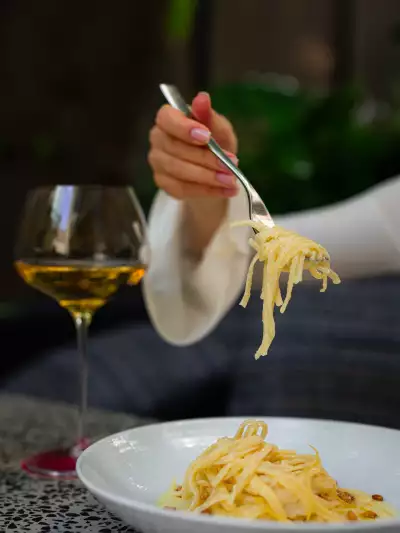 Italian restaurants Toronto | Someone scoops up a forkful of noodles at Sofia Italian Restaurant Toronto