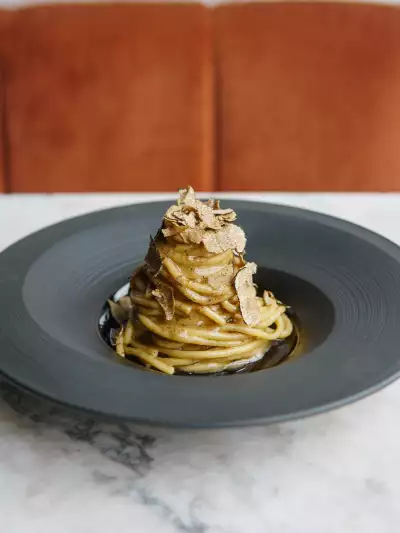 Italian restaurants Toronto | A plate of creamy pasta with truffle at GIA Italian restaurant in Toronto