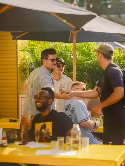 The best bars in Toronto | Guests enjoying the patio at Pennies