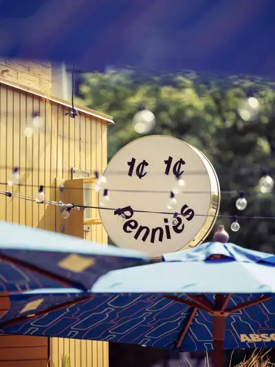The best bars in Toronto | The logo and patio umbrellas at Pennies