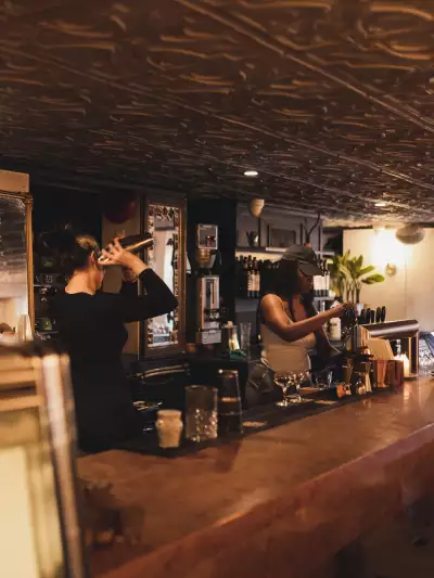 The best cafes in Toronto | Bartenders preparing drinks at Piccolo Caffe E Vino