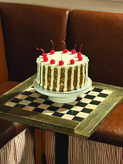 The best cafes in Toronto | A decorated cake at Coco's neighbourhood coffee shop