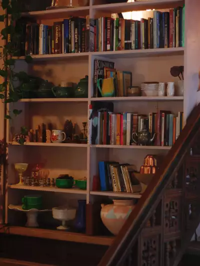 The best cafes in Toronto | A bookshelf at Coco's neighbourhood coffee shop