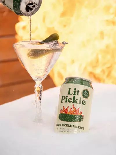 A can of Lit Pickle with a martini