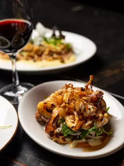 Best new Italian restaurants Toronto | Calamari and wine at Notte Ristorante