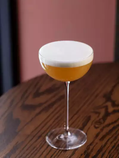 A foamy cocktail at Bar Allegro