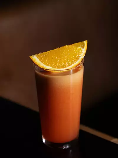 A cocktail with an orange at Bar Allegro