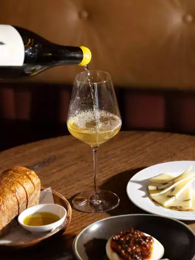Pouring wine at Bar Allegro