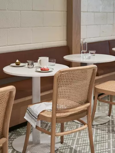 Bistro seating inside Gateau Ghost