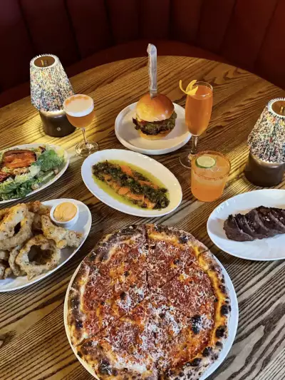 Sonny Can't Dance | a spread of dishes and cocktails