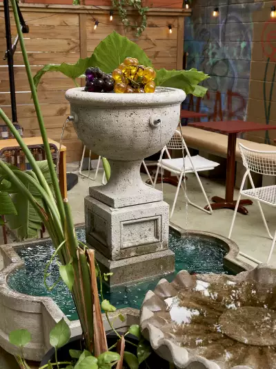 The fountain on the back patio at Grape Witches on Dundas