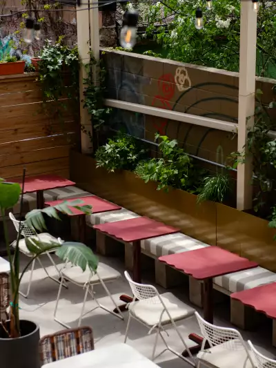 Banquette seating on the back patio at Grape Witches on Dundas