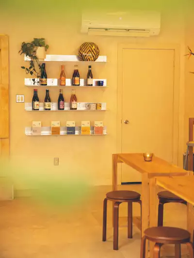 Best caf&eacute;s and coffee shops in Toronto | Shelves of wine at Nile Coffee & Bar