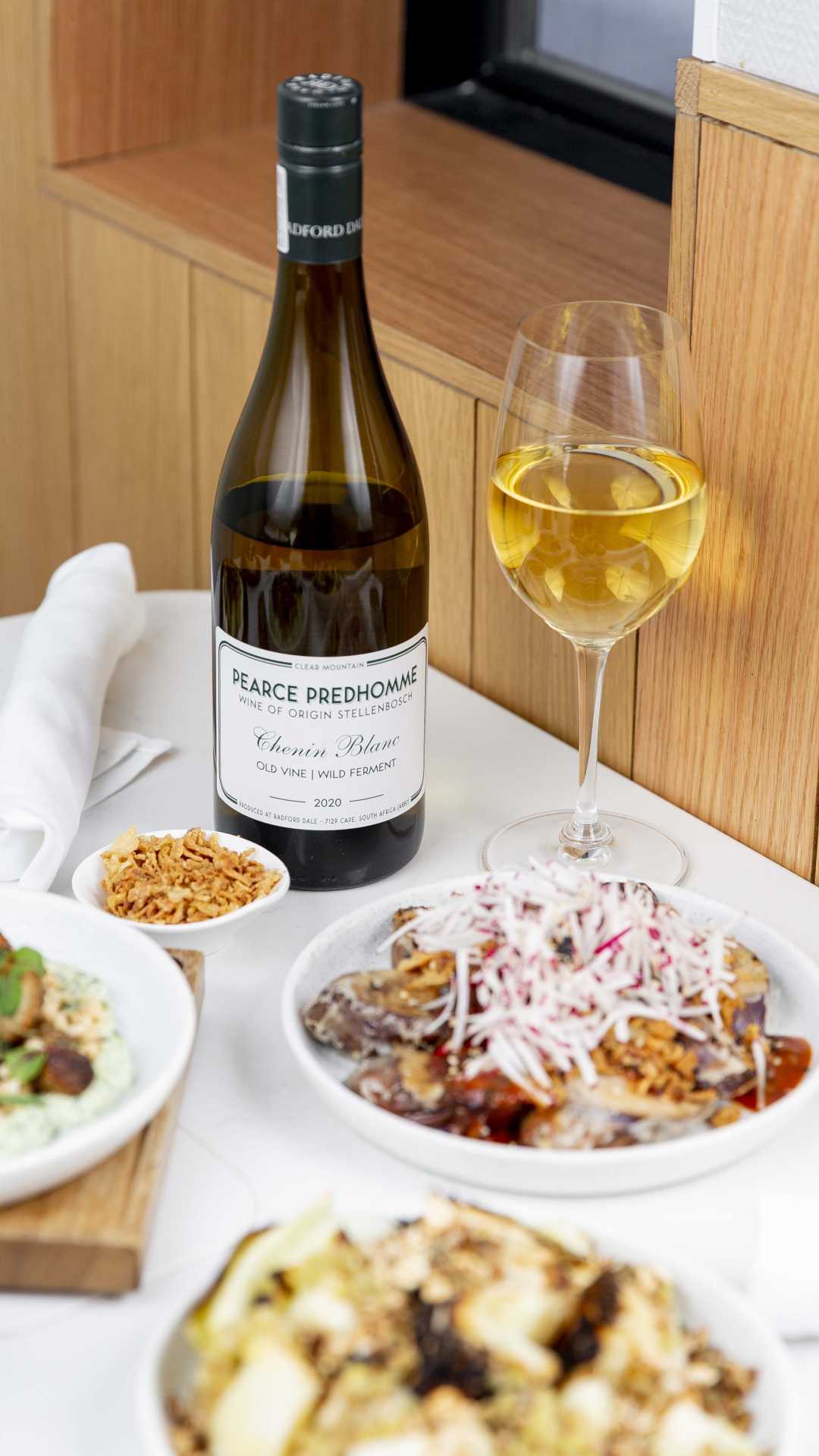 Sara wine pairing | A spread of wine and small plates at Sara Sara wine pairing | A spread of wine and small plates at Sara