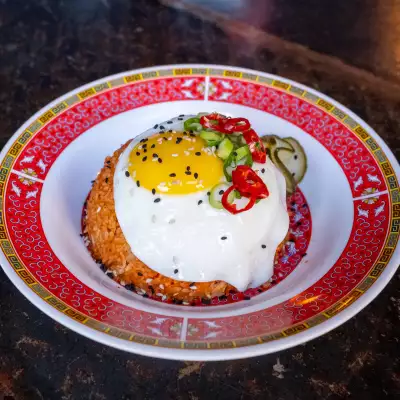 A dish topped with an egg at OddSeoul