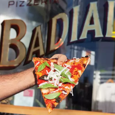 A slice of pizza at Pizzeria Badiali