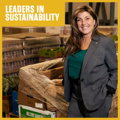 Lori Nikkel standing by food and boxes