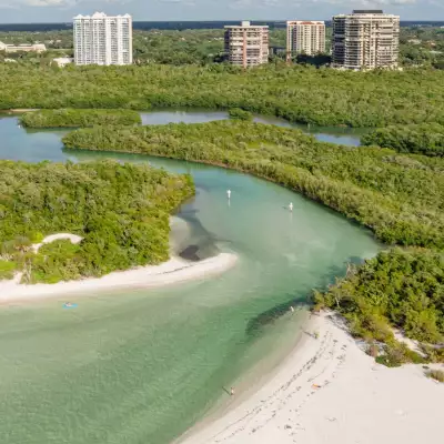 A stunning beach and highrise buildings on Florida's Paradise Coast