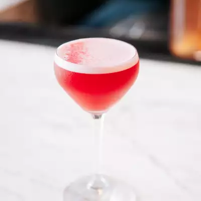 The best cafes in Toronto | A red, foamy cocktail at 10 Dean