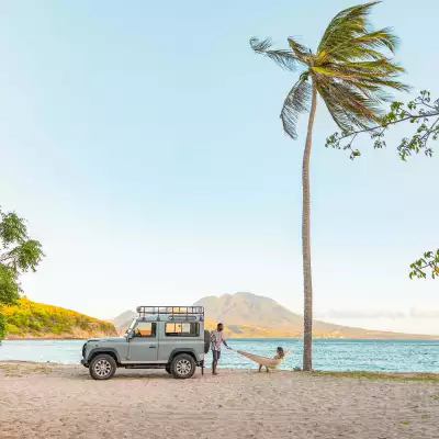 A man and woman on a beach in St. Kitts