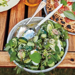 Cucumbers with herby yogurt dressing and sesame seeds recipe