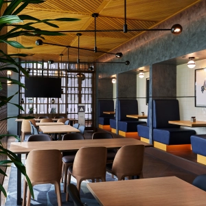 New Toronto restaurants | A comfortable seating area with a TV at TABLE Fare + Social