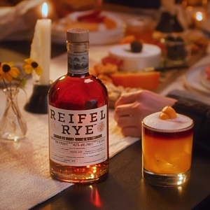 Holiday bottles to gift | Reifel Rye with a cocktail on the dinner table Holiday bottles to gift | Reifel Rye with a cocktail on the dinner table