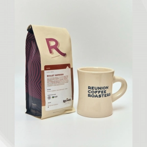 A bag of Reunion's Bullet Espresso with a Reunion mug A bag of Reunion's Bullet Espresso with a Reunion mug