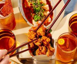 Where to watch the FIFA World Cup in Toronto | Chopsticks reach for a fried chicken bite at Simpl Things in Parkdale