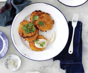 Latke recipe served with vegan chili cream
